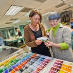 Kimiake Higuchi and Lisbeth Biger look at glass color samples