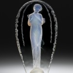 Statuette, Grande ovale tête penchée (Large oval, inclined head) Combs-la-Ville, designed 1919 Mold-pressed glass, acid-etched H. 37.2 cm, W. 20.2 cm, D. 9.8 cm 2011.3.201, gift of Elaine and Stanford Steppa