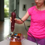 Melting colored plastic plates to become replicas of Dale Chihuly’s Macchia Series.