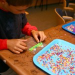 Replicating the process of fusing glass murrine slices using beads.