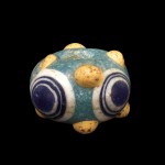 Composite Eye Bead, core-formed, trailed. Possibly Carthage (in modern Tunisia), possibly Eastern Mediterranean, 600-250 BC. Diam (max): 1.2 cm, Th: 0.8 cm. (54.1.143-3)