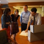 Laura, Bonnie, and Jim check out the archives at Temple Emanu-El with Curator Warren Klein.