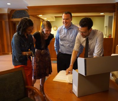 Laura, Bonnie, and Jim check out the archives at Temple Emanu-El with Curator Warren Klein.