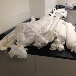 Rolls of objects in the Preservation Lab waiting to be unrolled fully for the very first time!