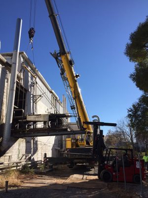 Section of the Ribbon Machine being craned out of the building