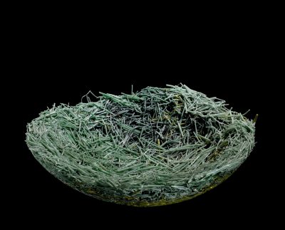 Clipped Grass (82.4.72): This piece and similar works by Toots Zynsky are made with applied glass threads that stick up and out making it easy for brushes to get caught during cleaning.