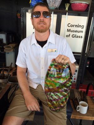 Aaron Jack with his Mardi Gras-inspired vase.