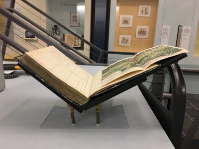 An example of a book resting on a custom book mount.