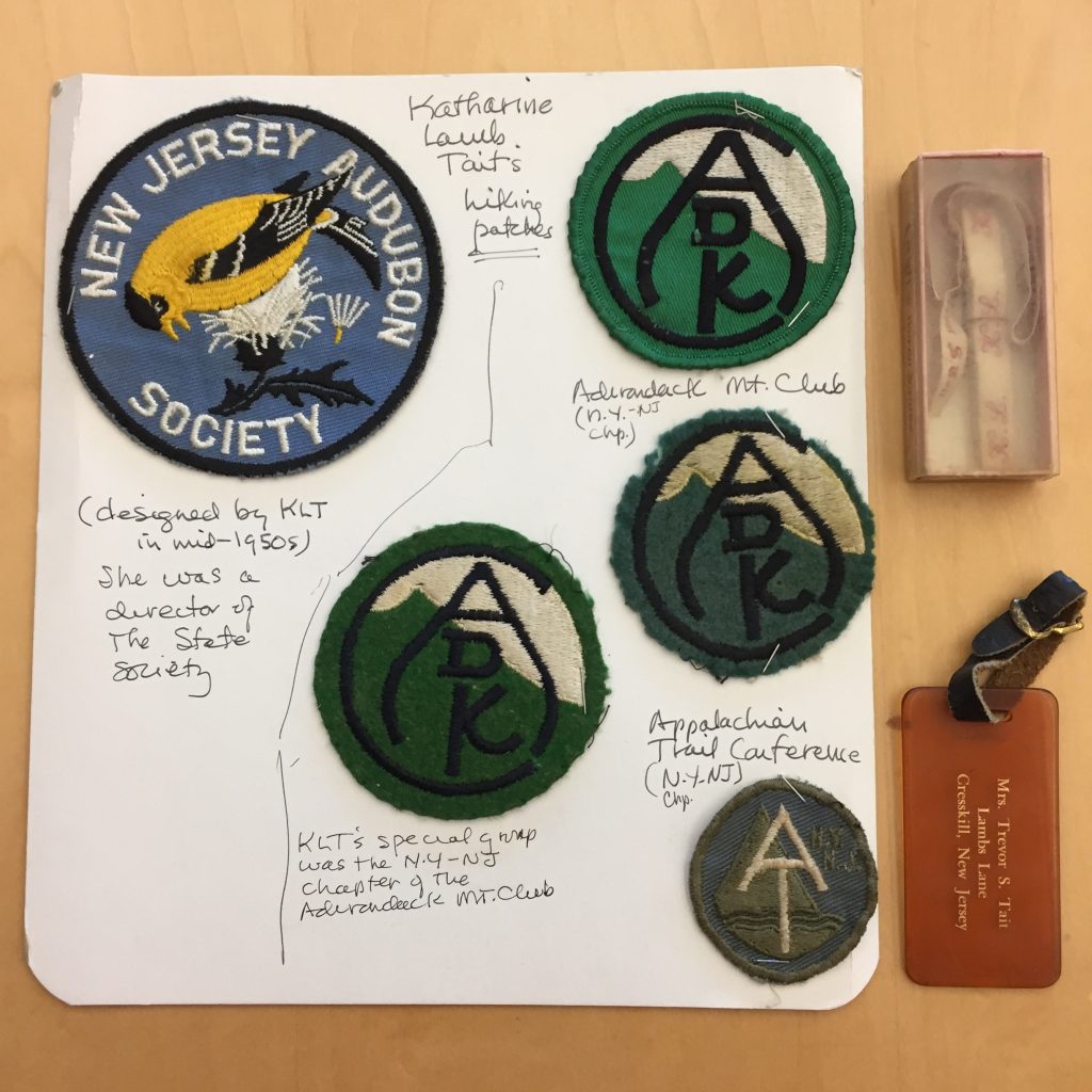 Tait’s hiking patches, clothing labels, and luggage tag