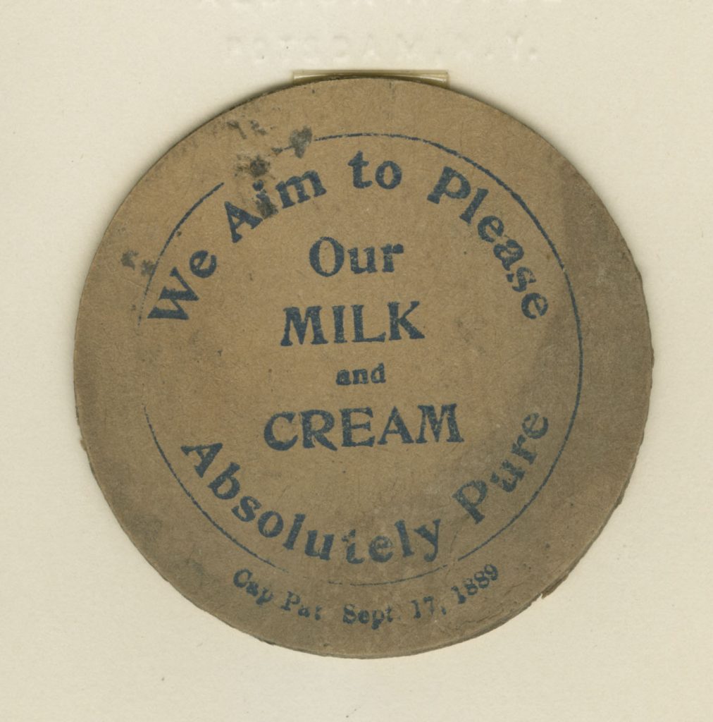 Paper milk bottle cap, sent to Samuel E. O’Connell from Fred J. Hayes.