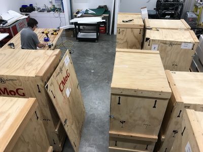 Overhead view for scale: Tom putting the final touches on the crates.