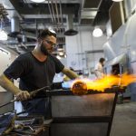 2014 Artist-in-Residence Anthony Cioe blowing glass at The Studio .