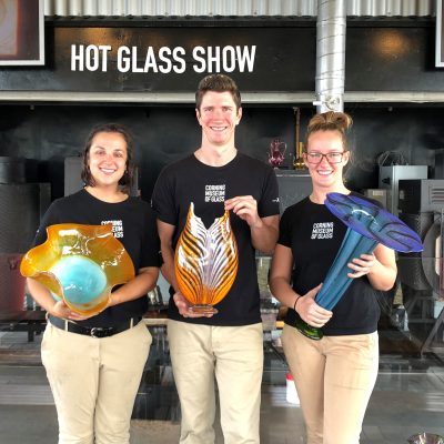 Stephanie Perry, Logan Brooks, and Kim Savoie show off their work from a recent cruise on the Celebrity Solstice.