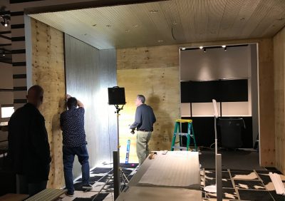 MAK Curator Rainald Franz with Preparators Tom Oberg and Steve Hazlett securing wall panels.